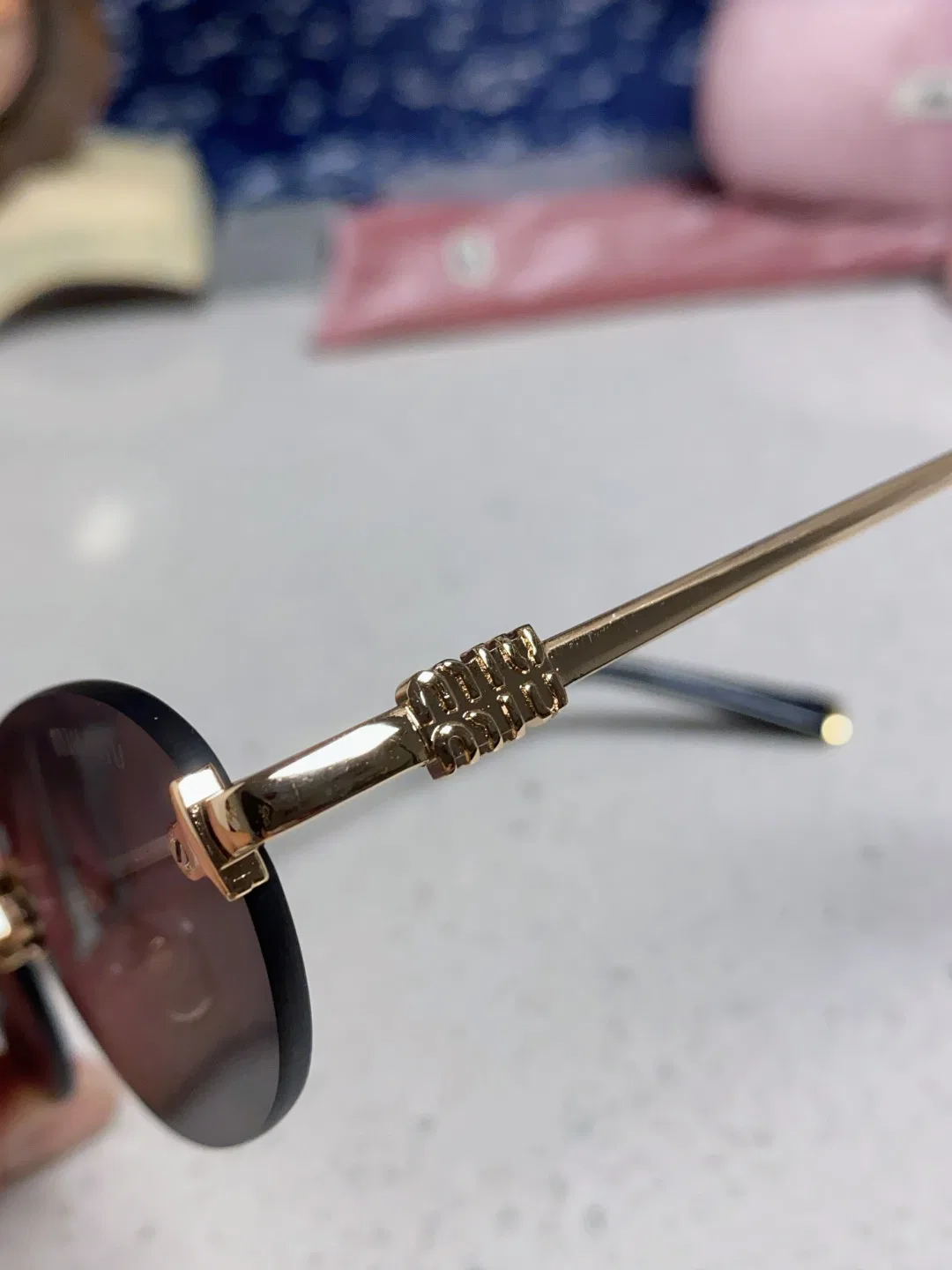 MIU 27FW EAVRMNO 001 선글라스 7