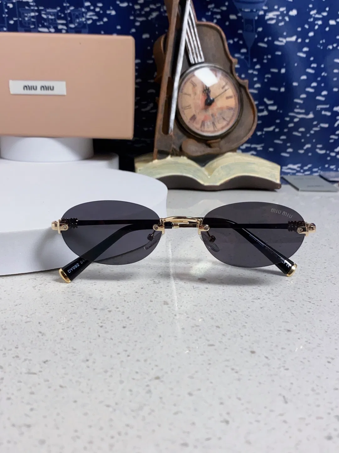 MIU 27FW EAVRMNO 001 선글라스 9
